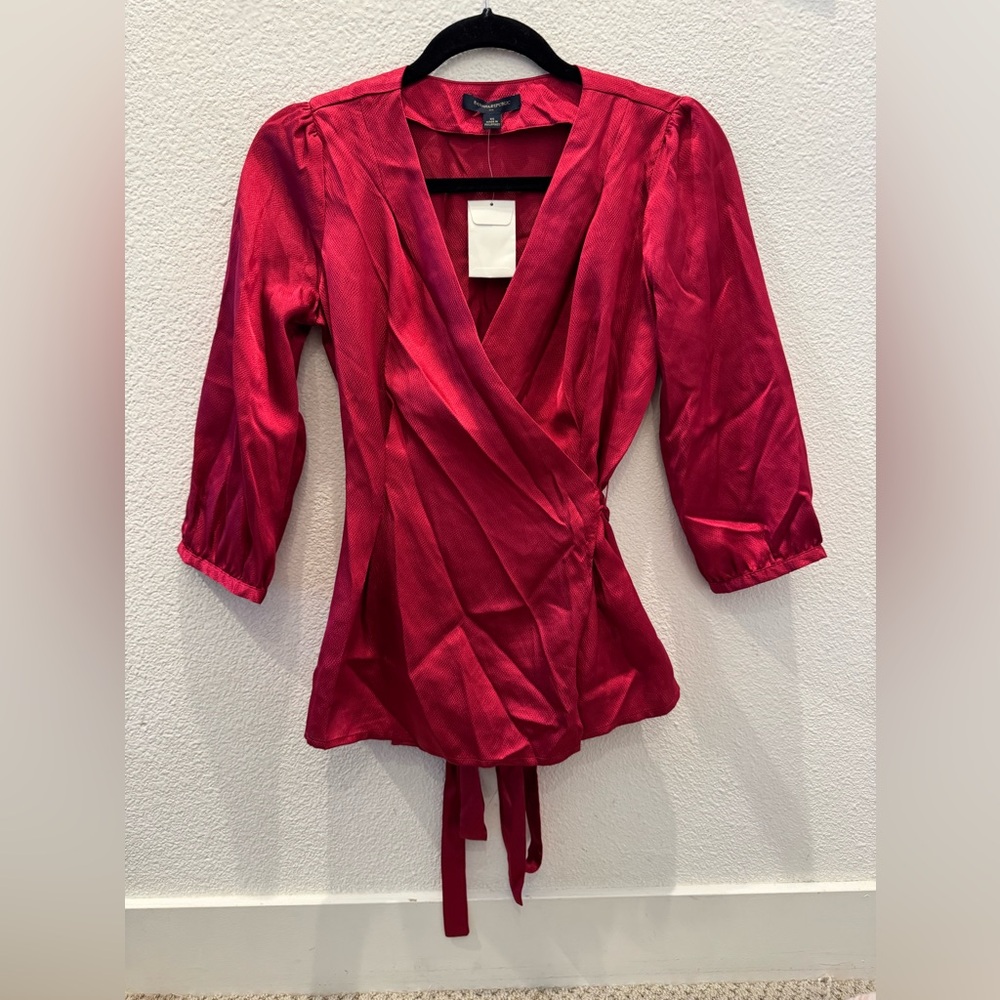 NWT - Banana Republic red satin wrap top with a v-neckline and tie waist